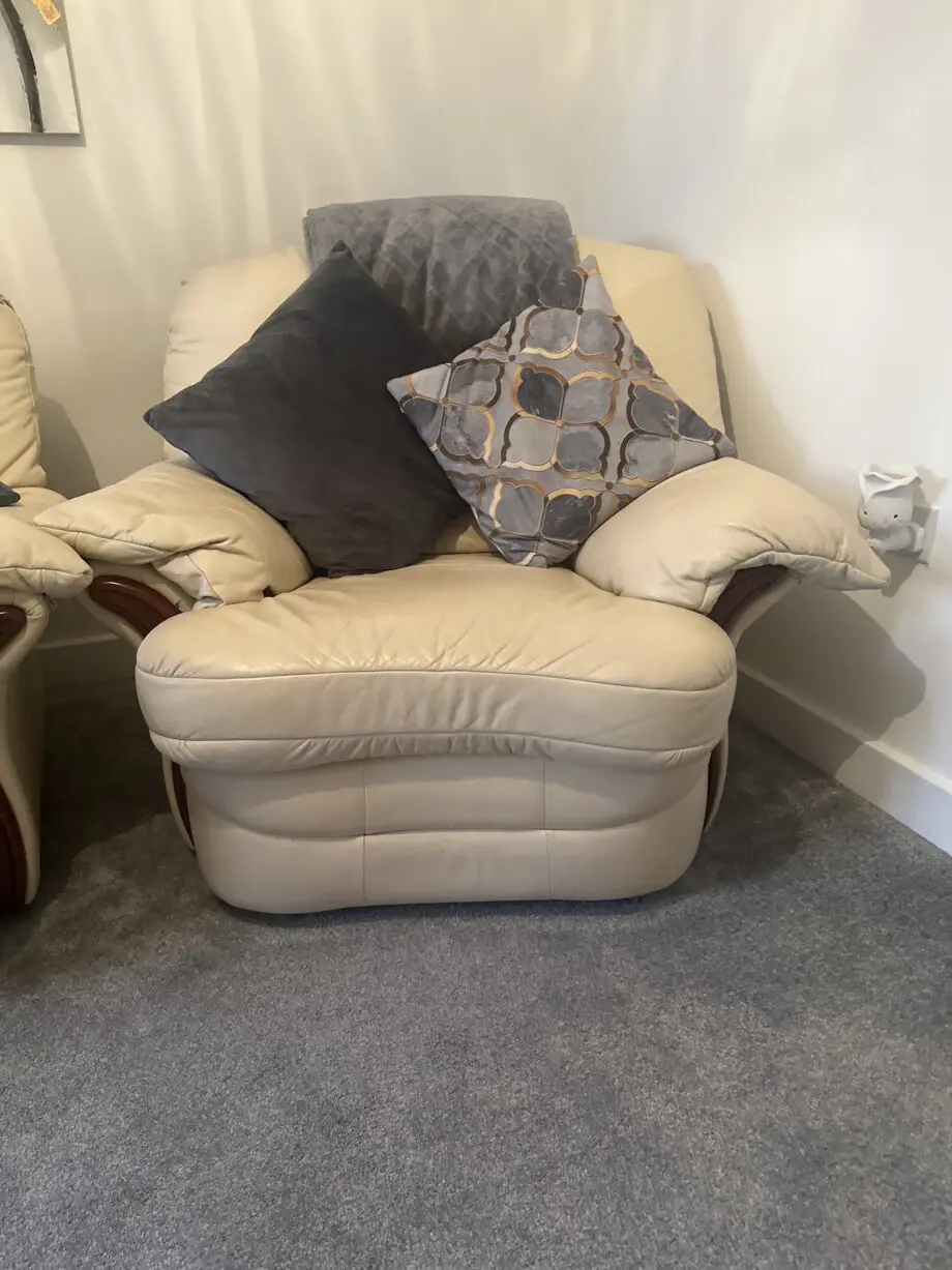 Cream leather chairs and sofa all reclining