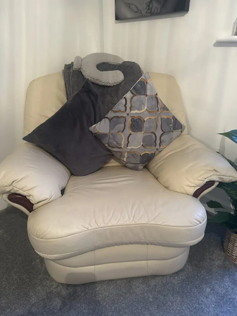 Cream leather chairs and sofa all reclining