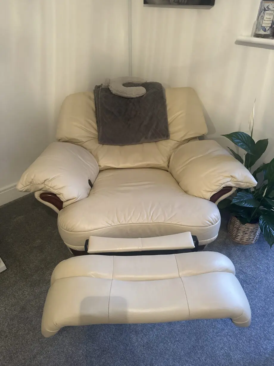 Cream leather chairs and sofa all reclining