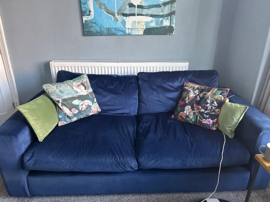 2 matching deep blue velour/velvet sofas
