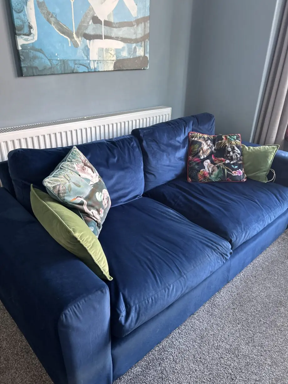 2 matching deep blue velour/velvet sofas