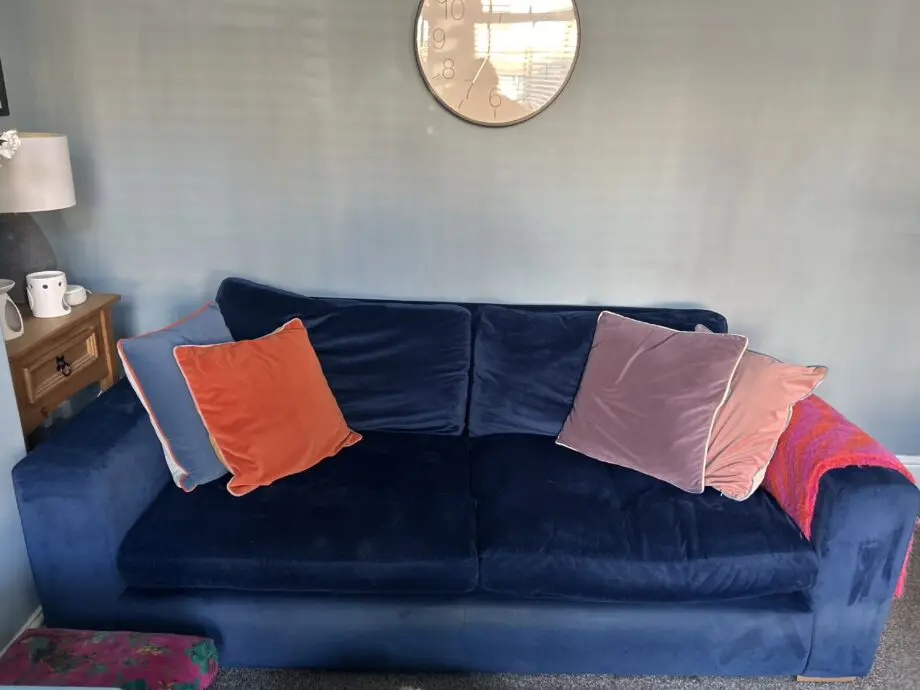 2 matching deep blue velour/velvet sofas