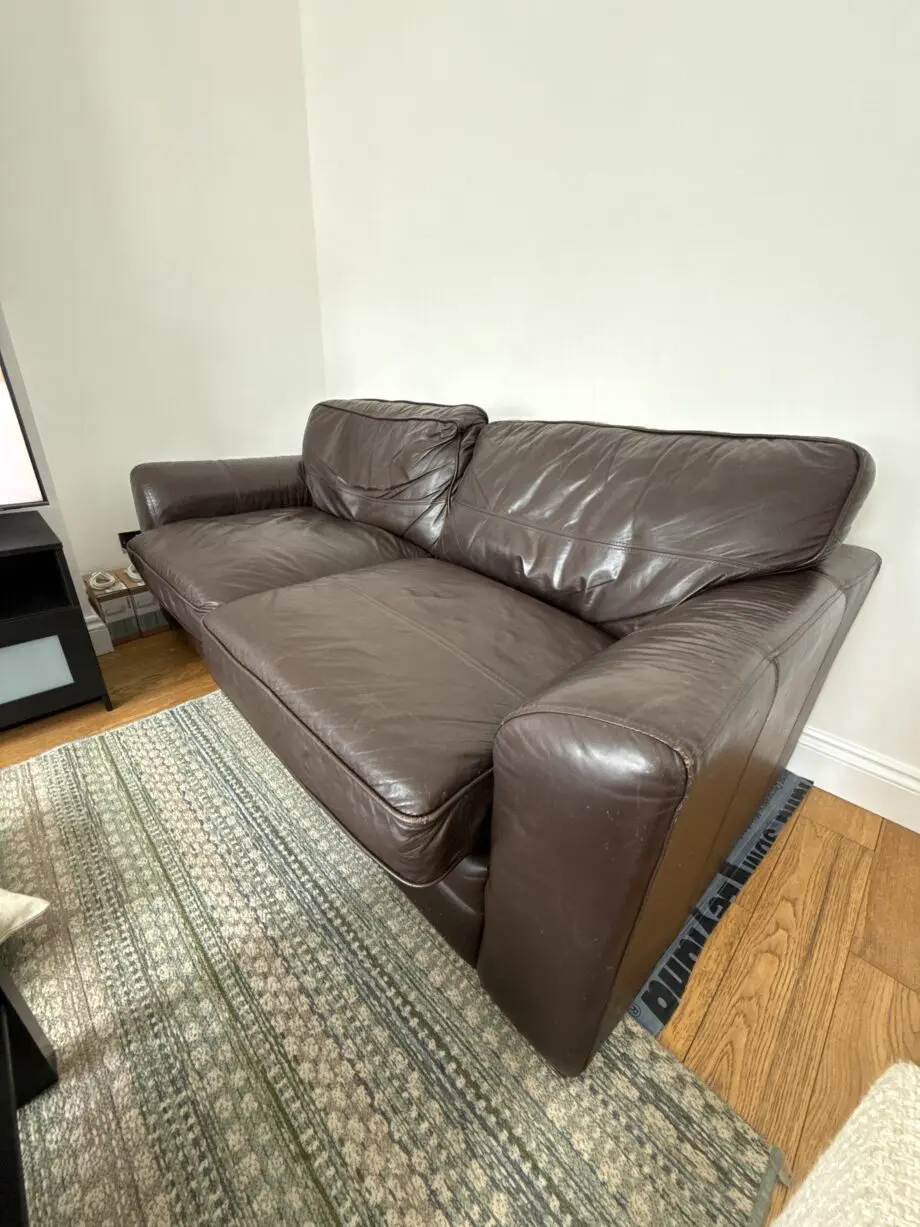 Brown leather sofa bed