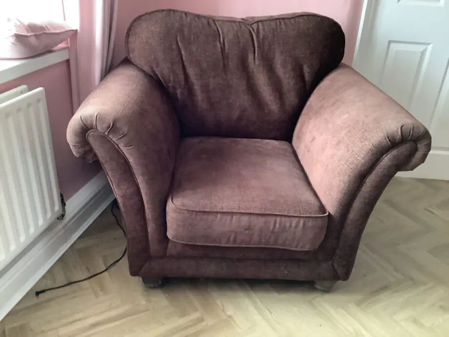 Brown fabric and 4 seater couch with matching chair and footstool.