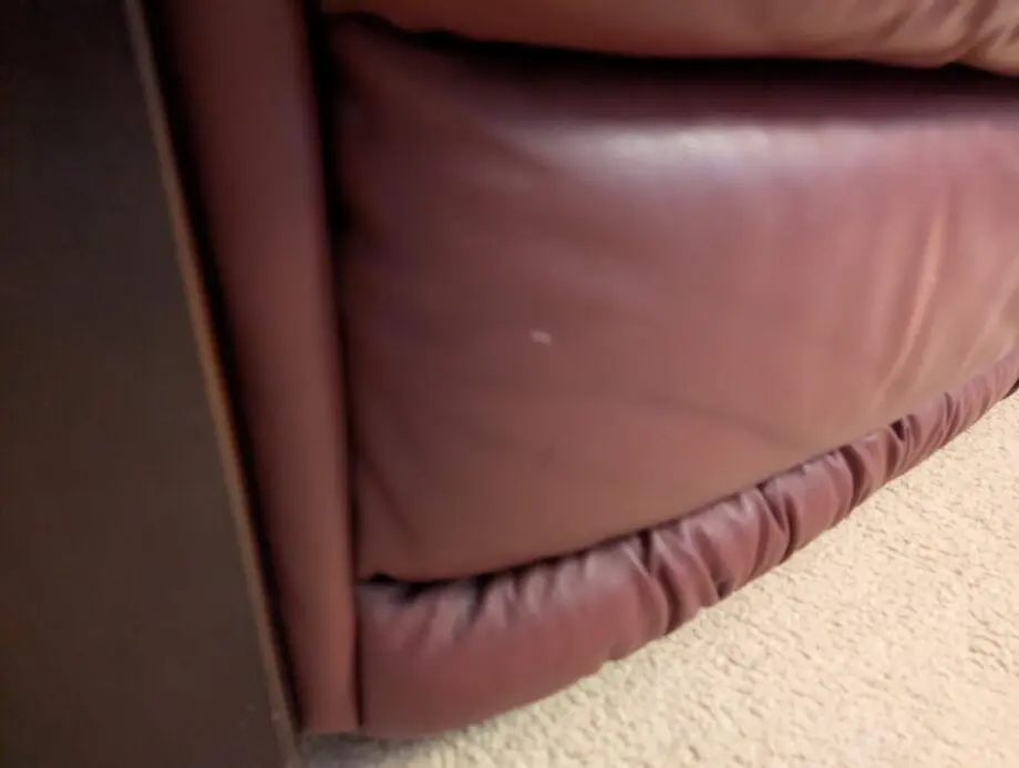 DFS Burgundy/Maroon Leather 2 seater sofa