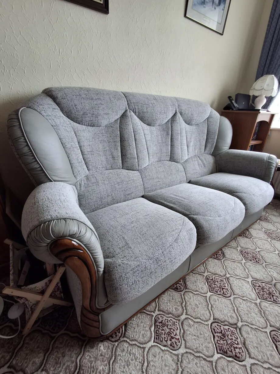 Grey, fabric and Italian leather, three seater settee and chair