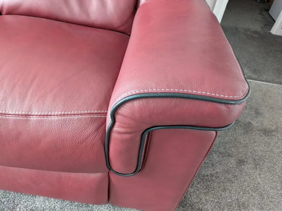 Large 2 x 2 seater leather sofas in red wine