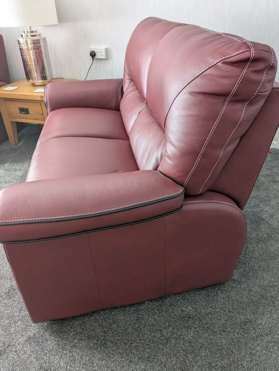Large 2 x 2 seater leather sofas in red wine