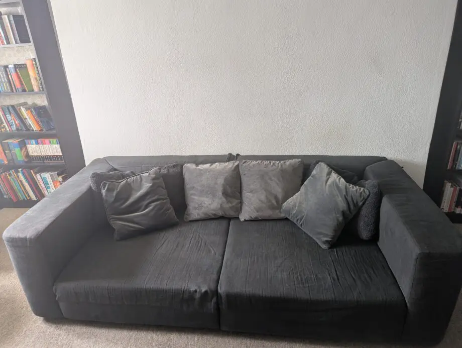 Large, dark grey 2 Seater sofa + cushions