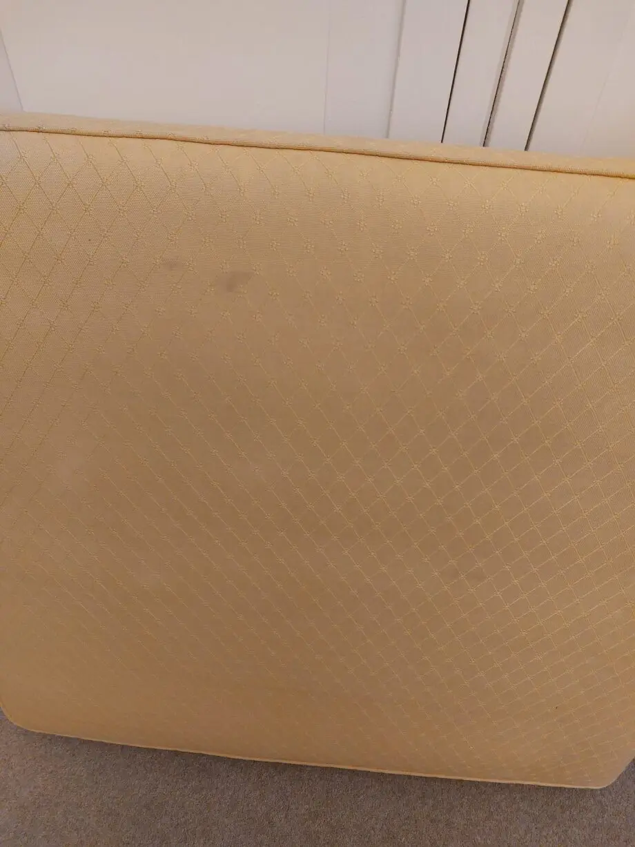 Multiyork, yellow, loose covered sofabed with fire reg label.