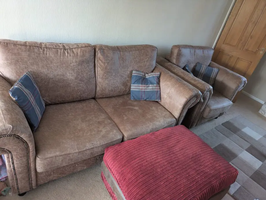 Faux leather sofa, armchair and pouffe