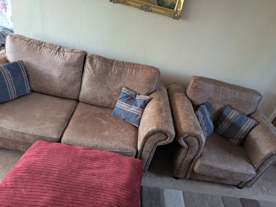 Faux leather sofa, armchair and pouffe
