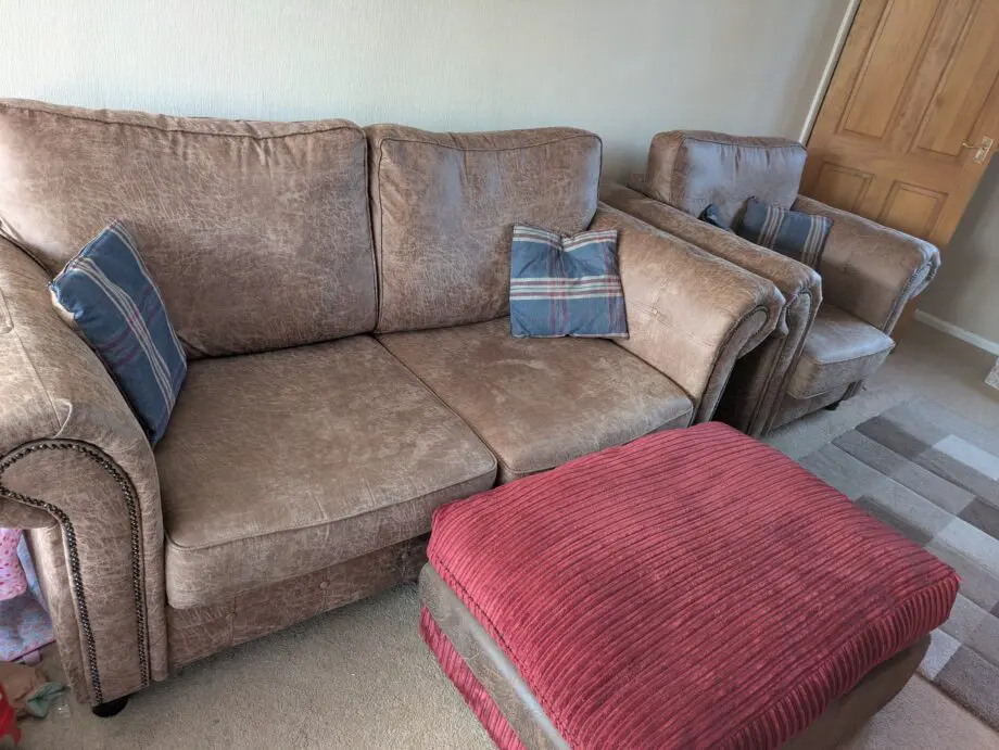 Faux leather sofa, armchair and pouffe
