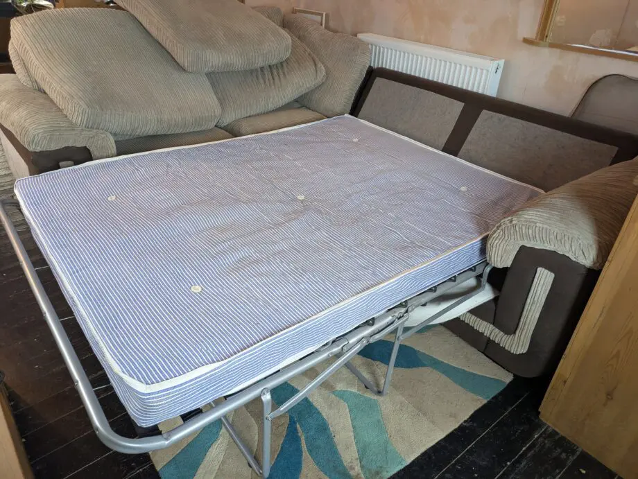 SCS L shaped sofa with pull out bed