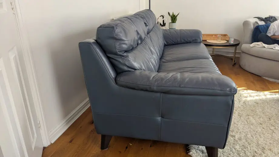 DFS leather 3 seater sofa and footstool denim blue