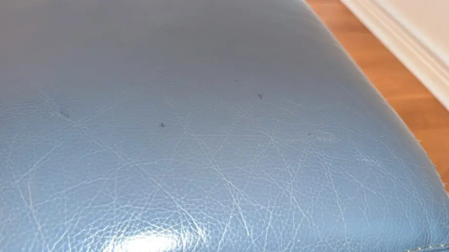 DFS leather 3 seater sofa and footstool denim blue