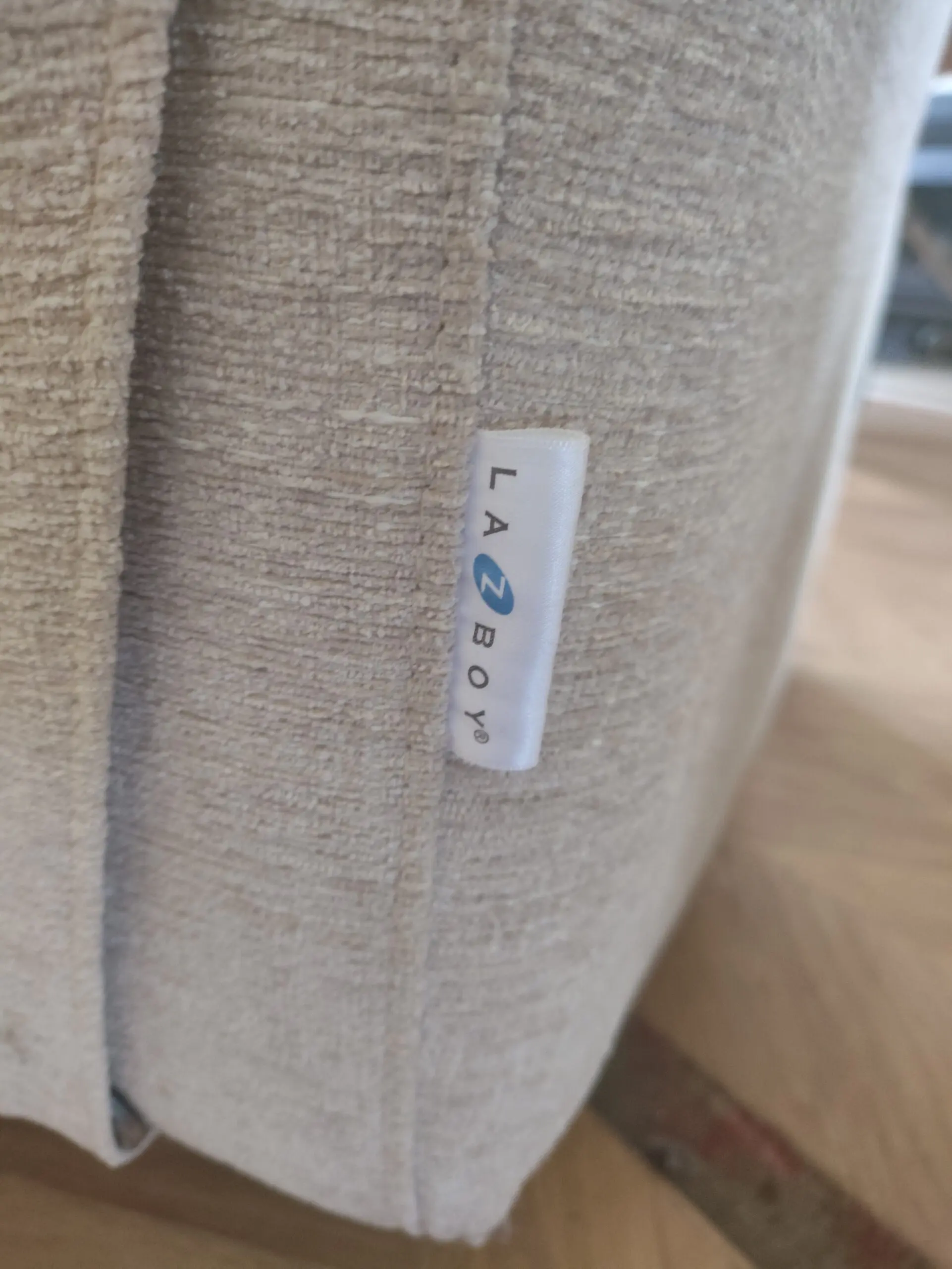 Cream 3 seater Lazboy recliner sofa.