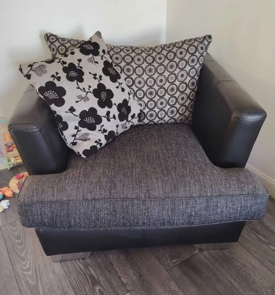 DFS black leather and textile chair