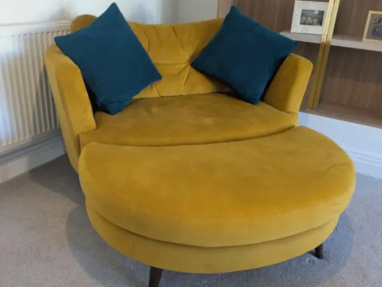 Stunning Velvet Love Seat with matching footstool by Lucas Furniture