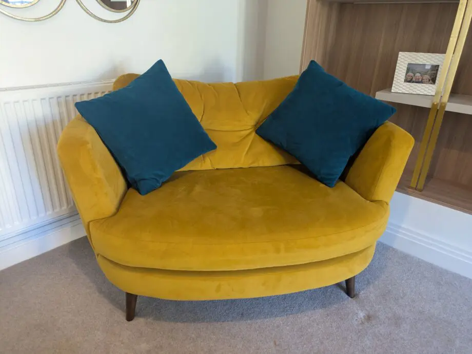 Stunning Velvet Love Seat with matching footstool by Lucas Furniture