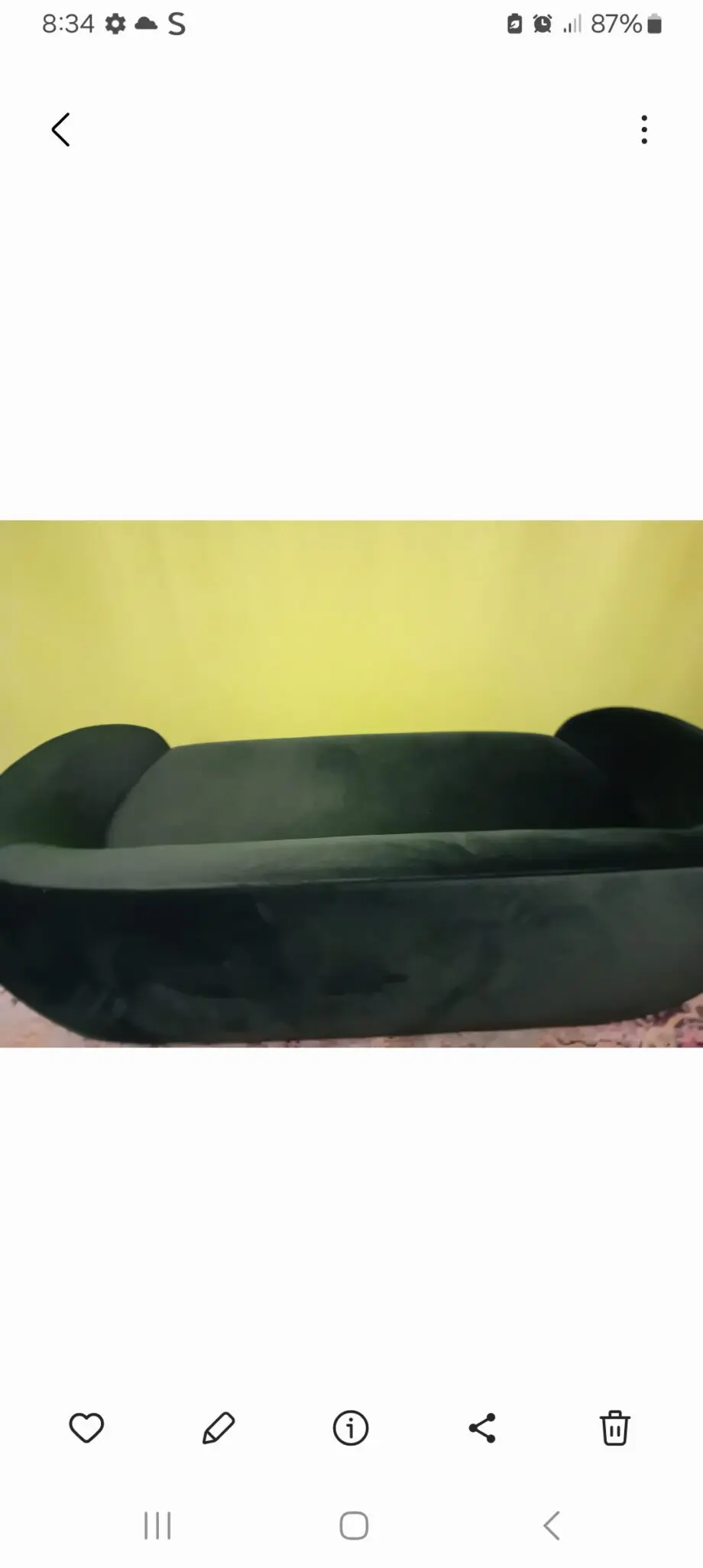 Made dark green sofa