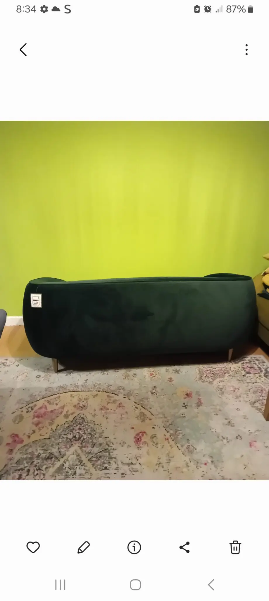 Made dark green sofa