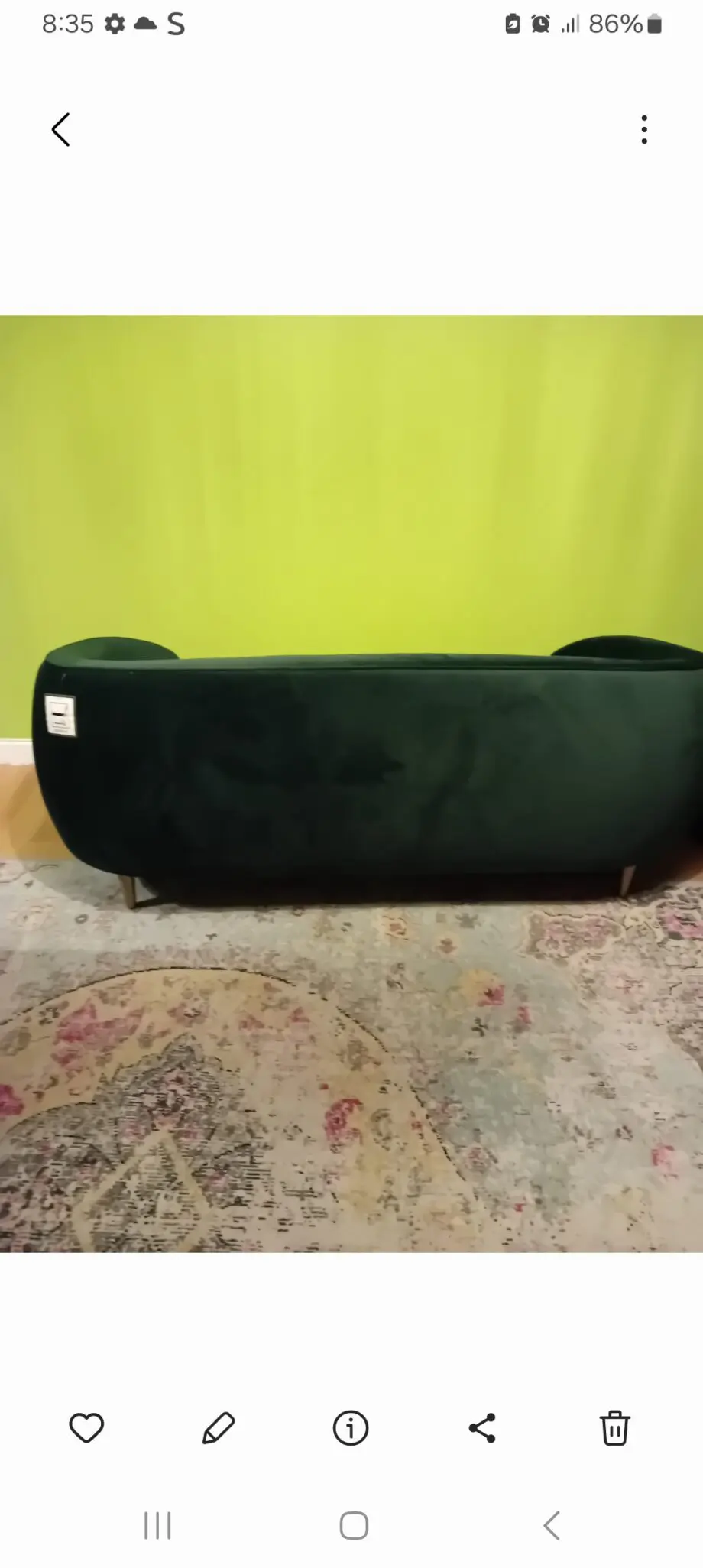 Made dark green sofa
