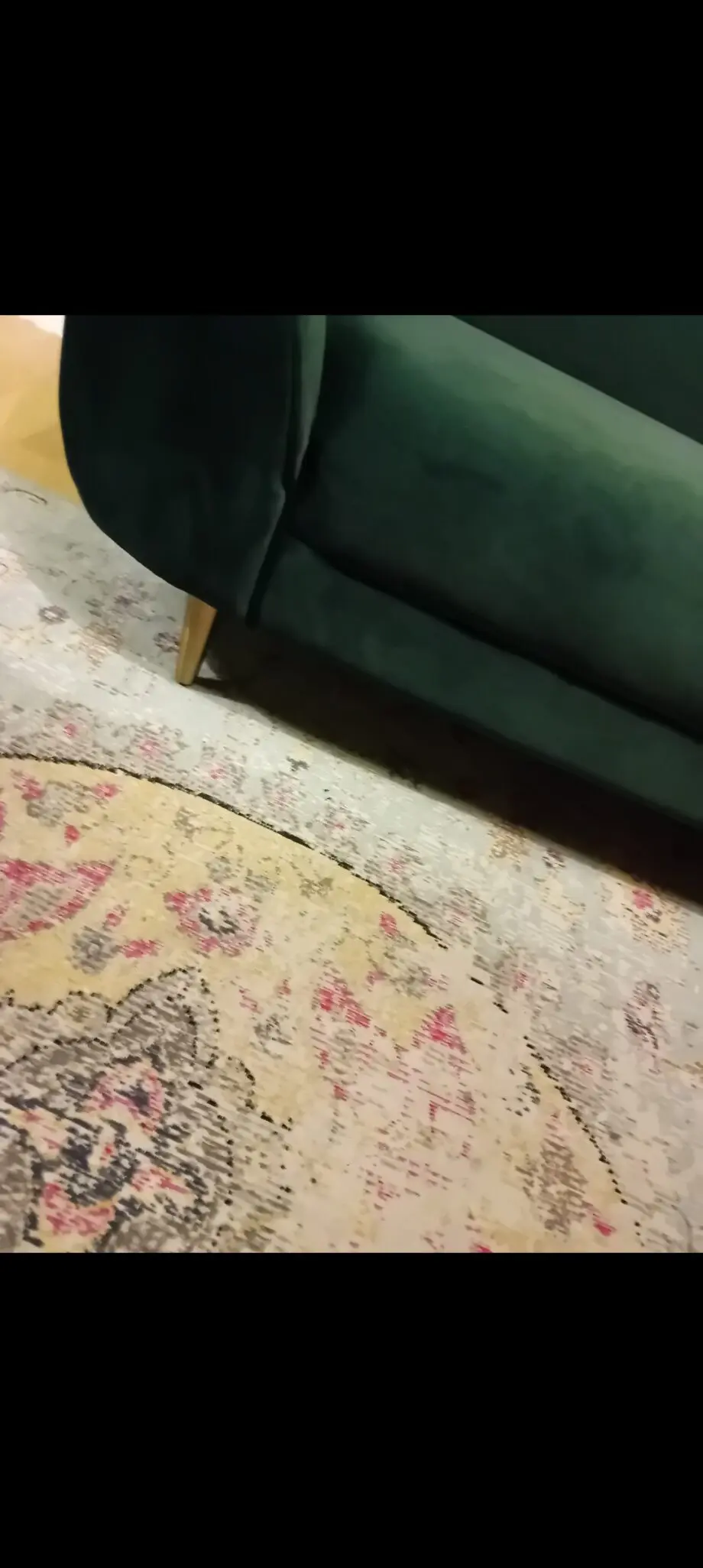 Made dark green sofa