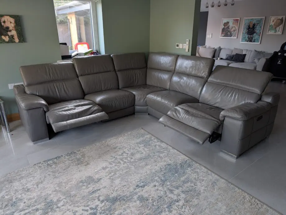 Sofology Laurence Corner Sofa - Fossil Grey Leather with Power ReclinersSofology Laurence 3 Seater/Corner/3 Seater Double Power Headrest / Double Power Recliner Sofa, in Fossil Grey with Chrome Feet. Was purchased in 2021 for £3799, but currently retails on the sofology website for £4399. The sofa is used and showing signs of such. Everything works, but the leather could do with some repair due to excessive wear on the edges as shown. The good news is I have been informed this is possible usually for a few hundred pounds... We are selling due to having changed our living room layout, a corner sofa now no longer works for us!!