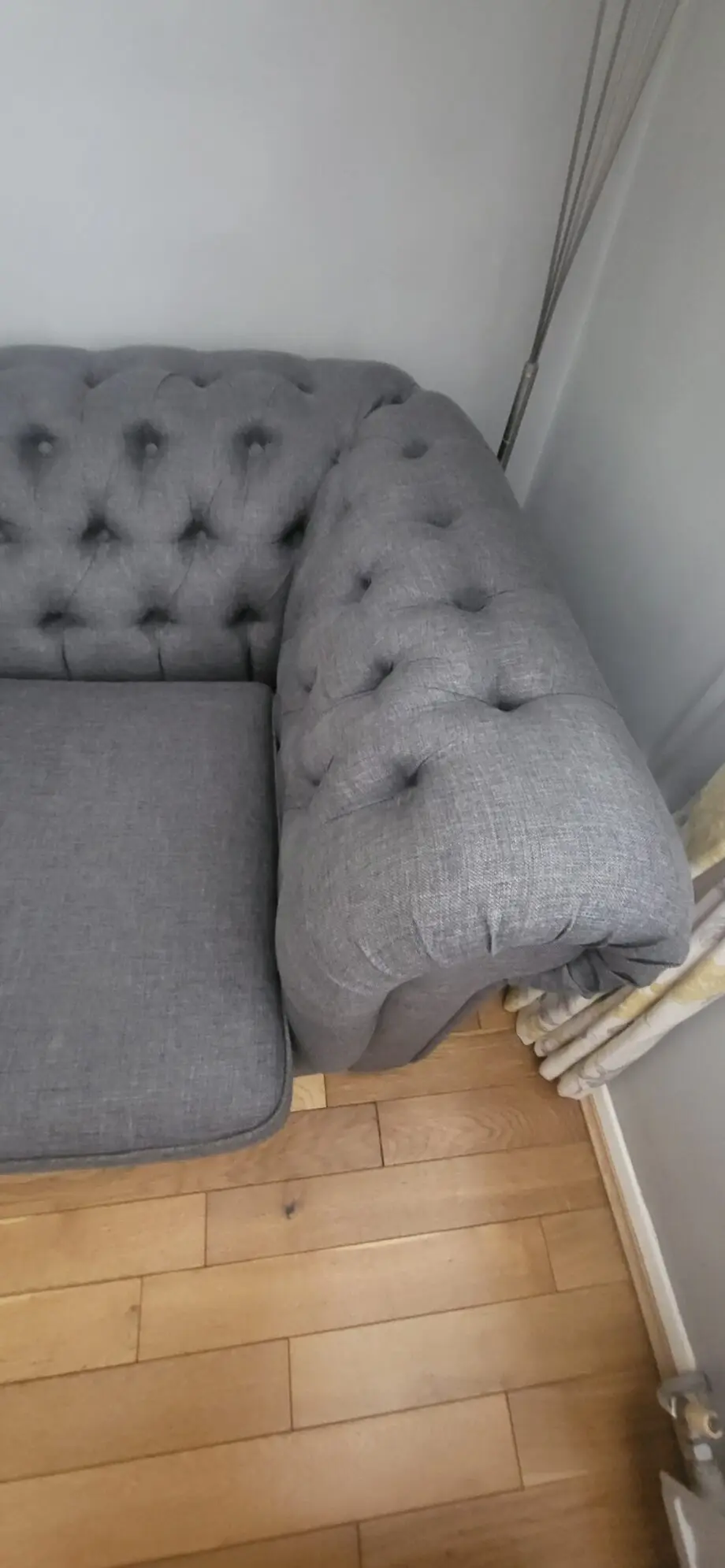 Grey fabric Chesterfield style sofas