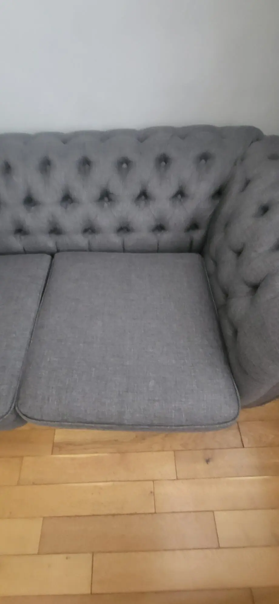 Grey fabric Chesterfield style sofas