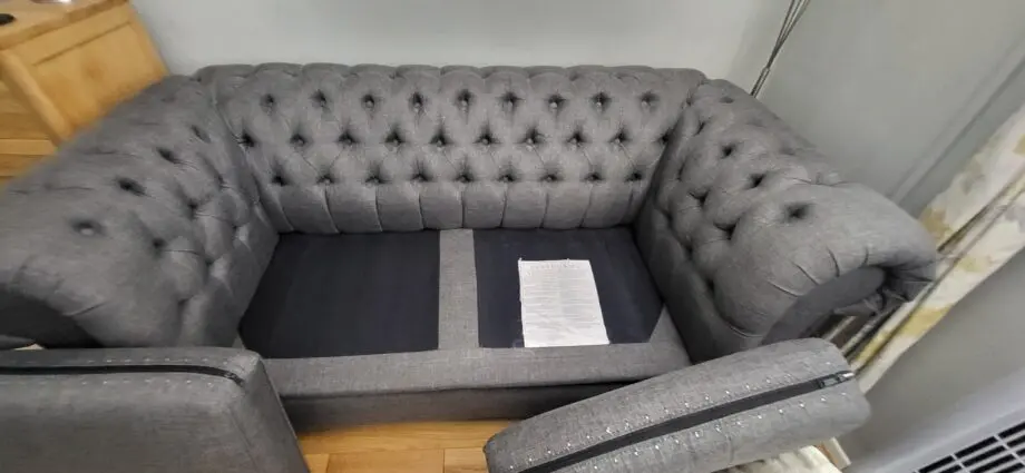 Grey fabric Chesterfield style sofas