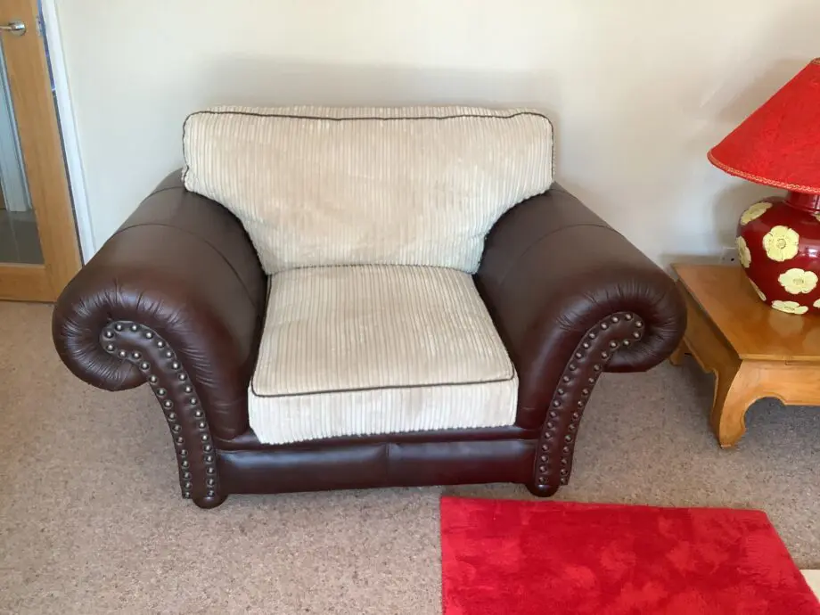 Brown Leather & Fabric Sofa with Soft Cream Cushions