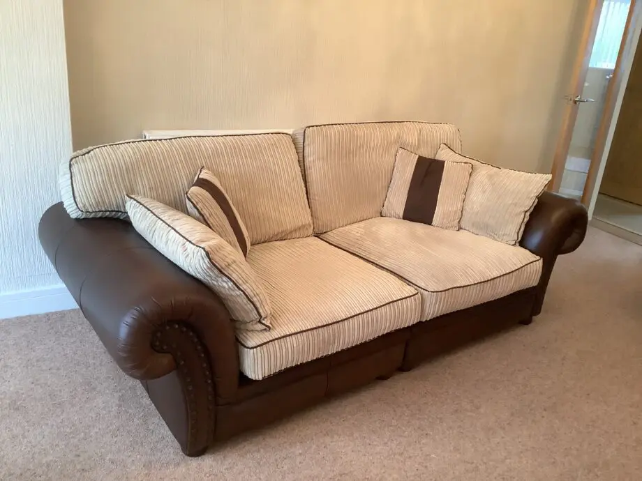 Brown Leather & Fabric Sofa with Soft Cream Cushions