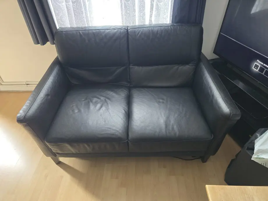 DFS black leather 3 and 2 seater sofas