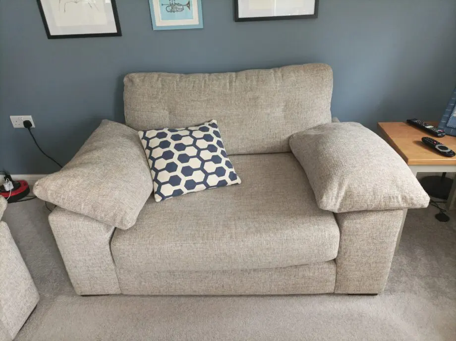 2 piece suite in grey: One large armchair+ 2 seat couch