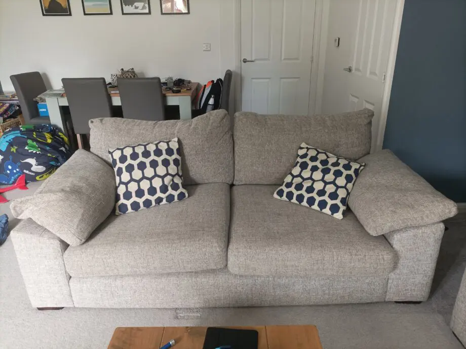 2 piece suite in grey: One large armchair+ 2 seat couch