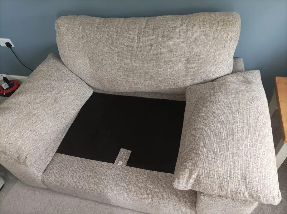 2 piece suite in grey: One large armchair+ 2 seat couch