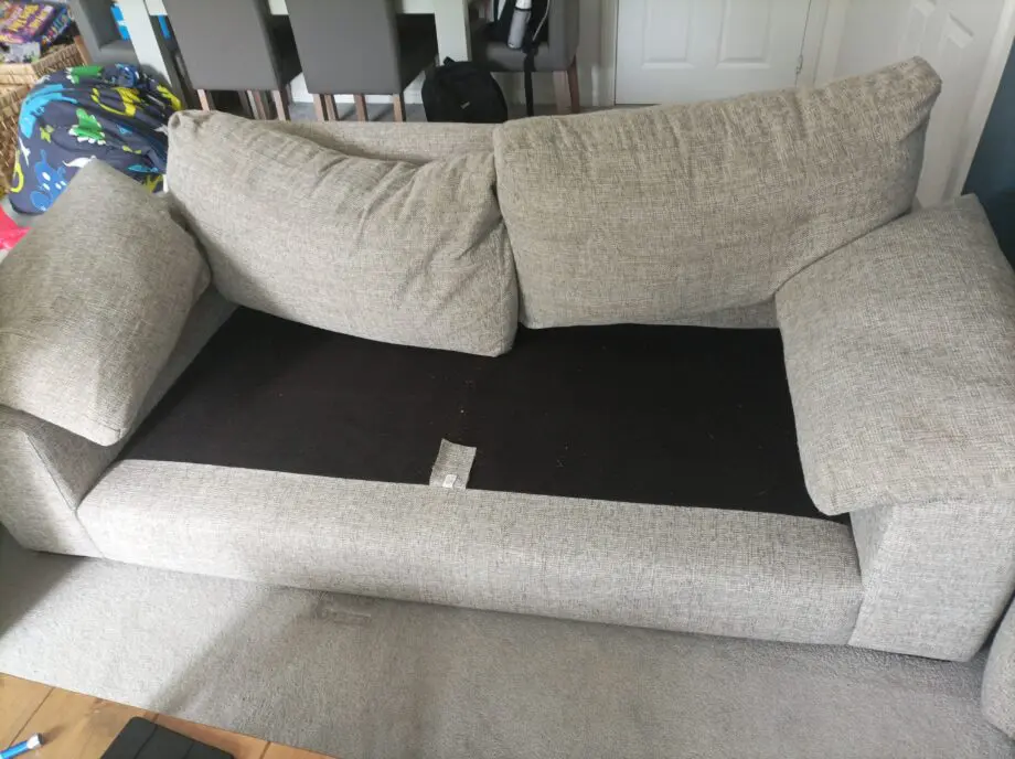 2 piece suite in grey: One large armchair+ 2 seat couch