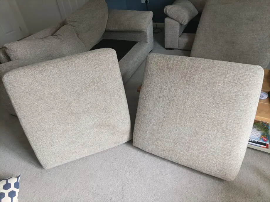 2 piece suite in grey: One large armchair+ 2 seat couch