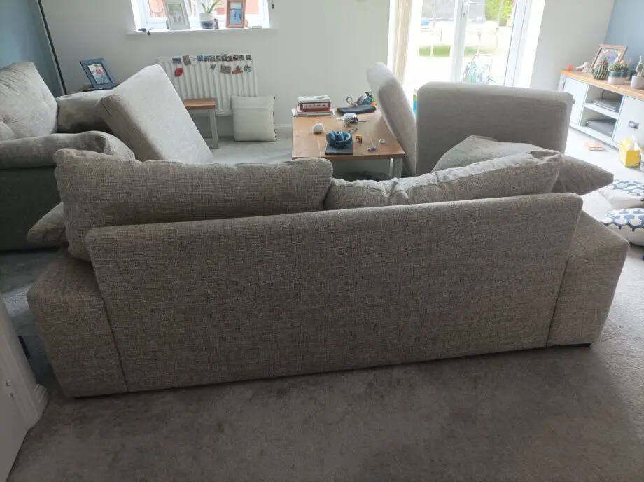 2 piece suite in grey: One large armchair+ 2 seat couch
