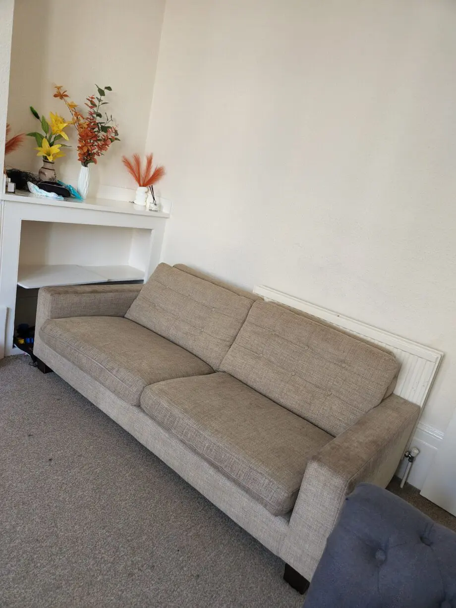 Beige Roger Lewis Furniture Company wide 2 seater sofa