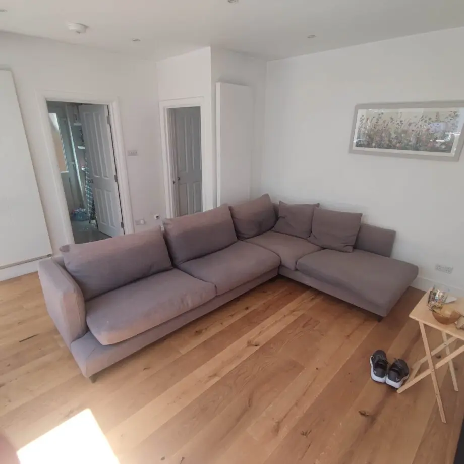Quality large L shaped "Camerich" sofa - fabric in grey (some sun lightening note)