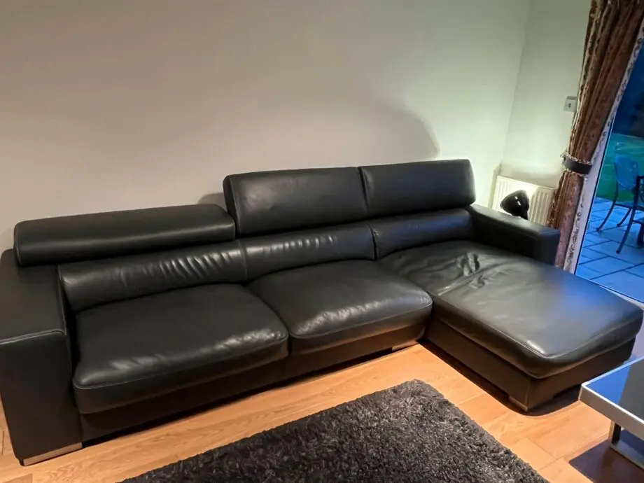 Amprezzo Grey Leather Couch with headrests