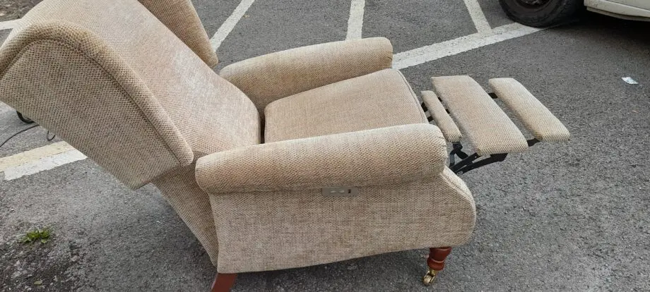 As new Parker Knoll electrically Reclining Armchair with USB port
