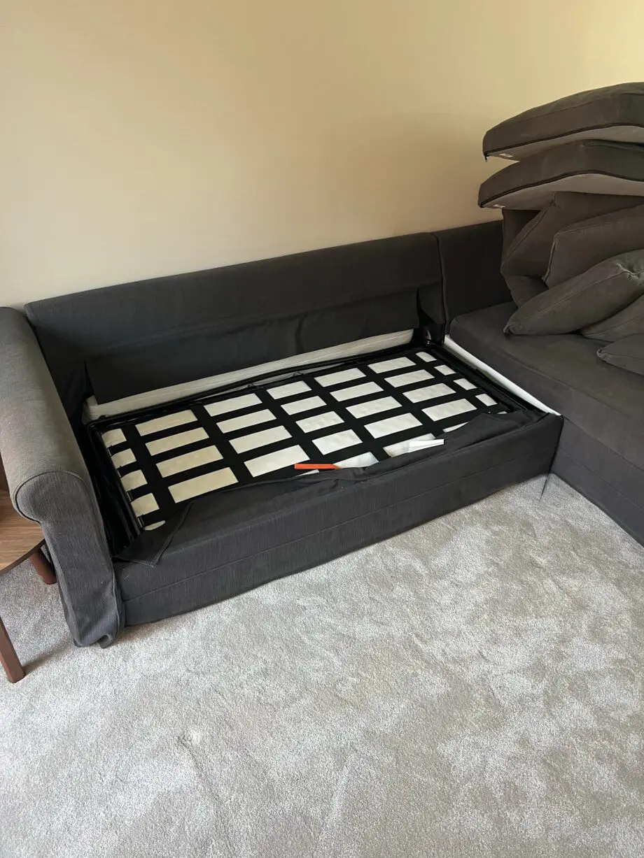 IKEA grey sofa bed with storage