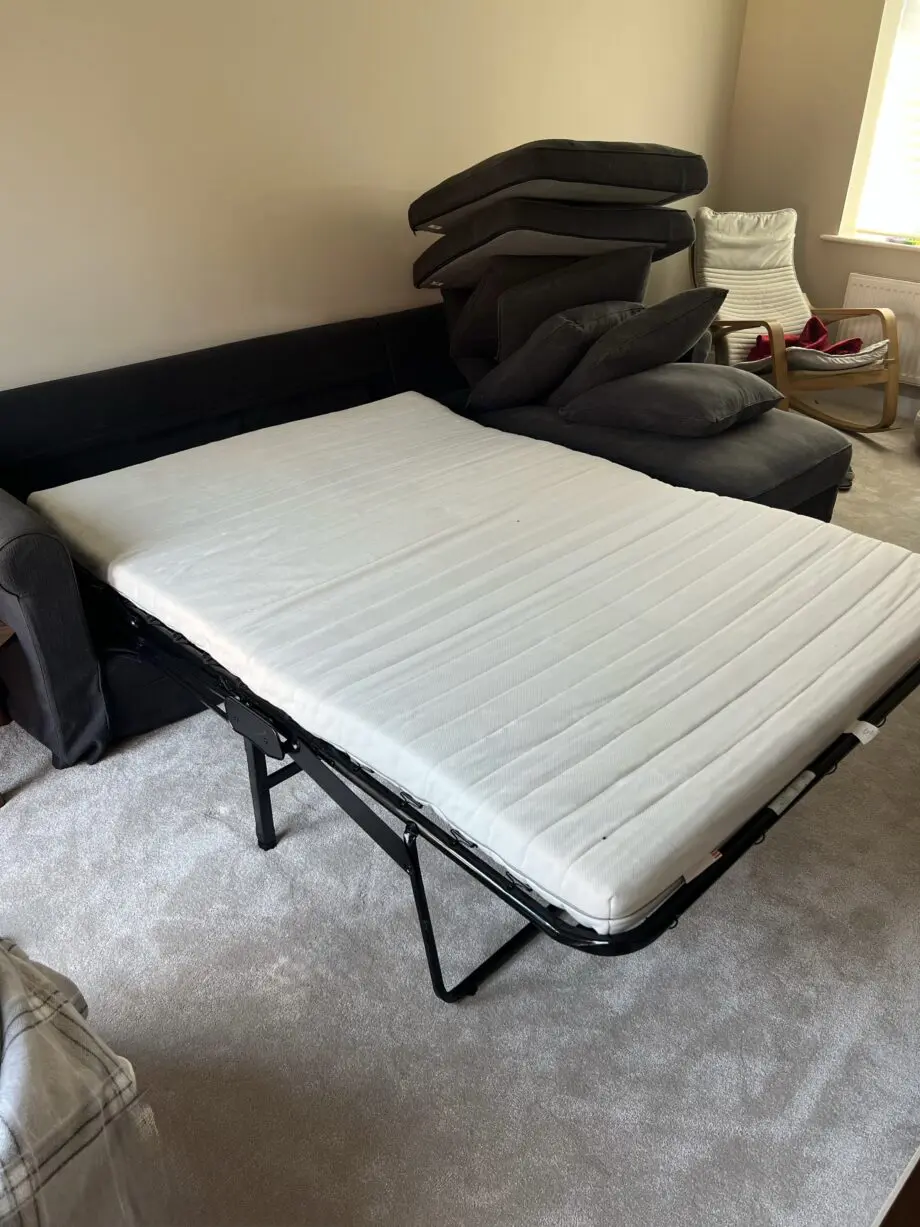 IKEA grey sofa bed with storage