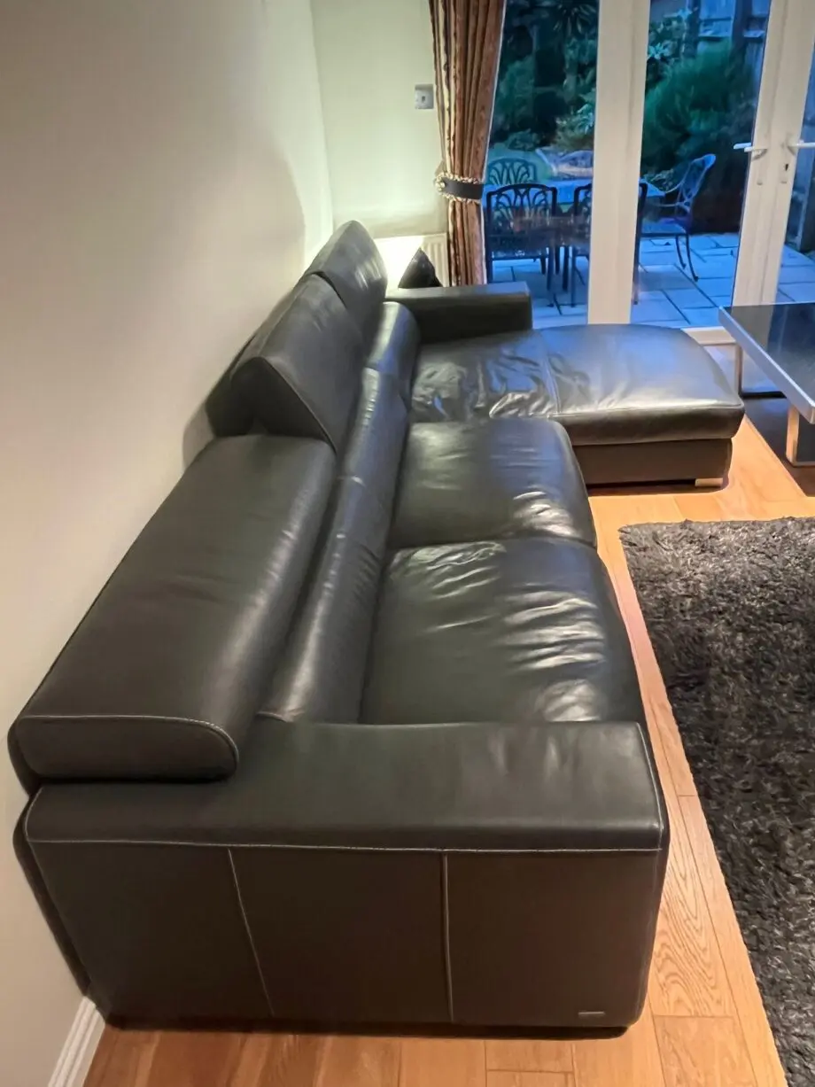 Amprezzo Grey Leather Couch with headrests