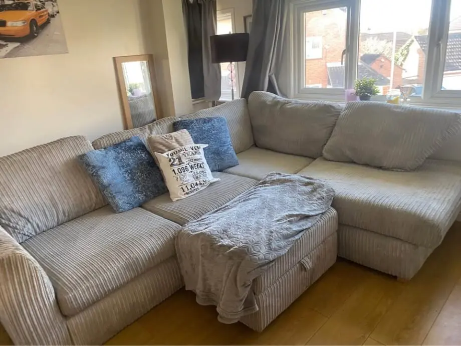 4 seater L shape high back sofa with matching pouffe