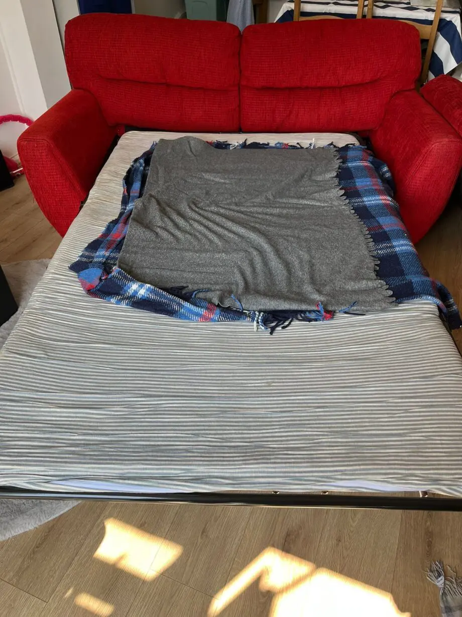 Red fold out sofa bed